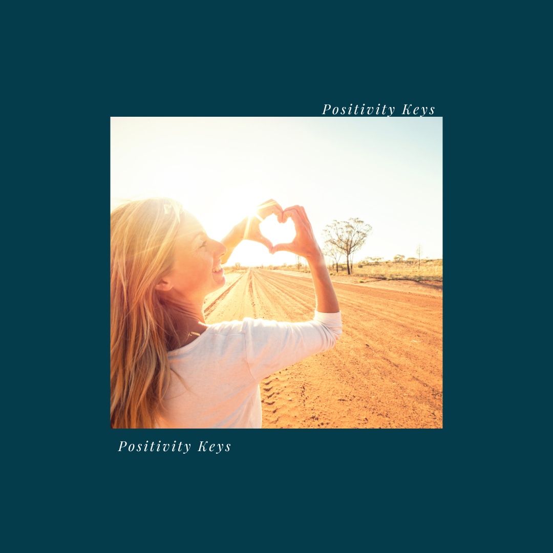 Woman shows heart with hands